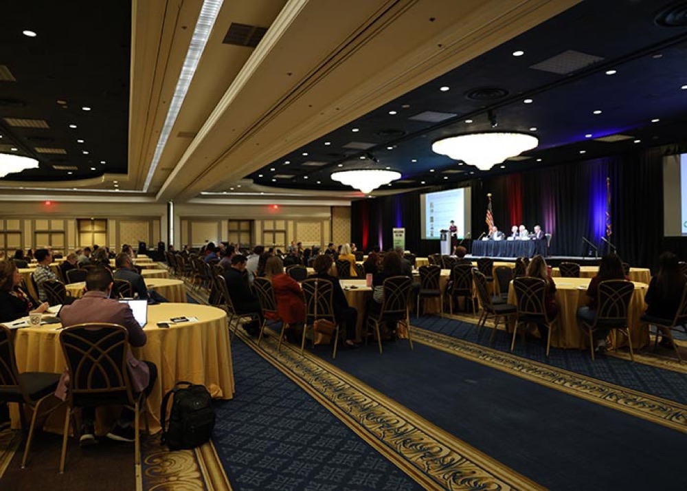 Panel session in a hotel ballroom at a Las Vegas HEALS event